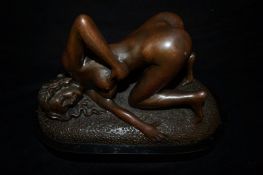 Bronzed figure of a lady.