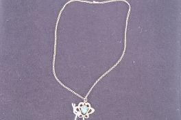 An art nouveau Gold and Turquoise and Pearl pendant and a gold chain.