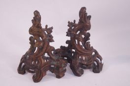 A pair of Victorian C scroll fire dogs