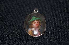 Small continental oval portrait on porcelain in a white metal mount