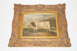 An oil on canvas of a cow, signed lower right, H Laurens (H 29.5cm W 39.5cm)