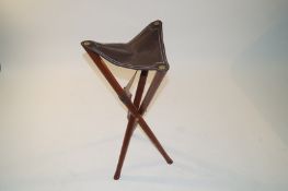 A stool with leather seat