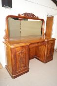 A large Victorian mahogany sideboard with mirrored back