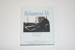 A signed Mohammed Ali book