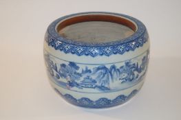 A large blue and white oriental jardiniere