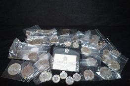 A good collection of various foreign coins, including various Swiss francs, Thai Baht along with