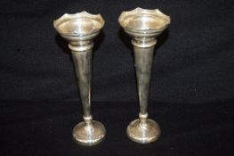 A pair of silver flute vases