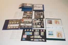 A collection of Royal Mail mint sets, first day covers etc. In several albums
