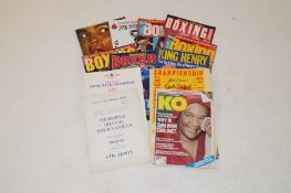 A small collection of boxing programmes, some signed