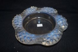 A Lalique dish decorated with flowers, etched to based R Lalique