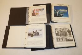 A collection of stamp albums including silk WWII