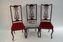 A set of four art nouveau chairs