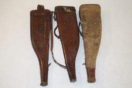 Three mutton leg gun cases