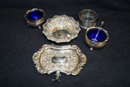 A collection of silver items including bon bon dishes, a pair of silver salts and various other