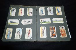 A good collection of various cigarette cards