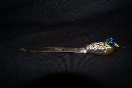 A silver and enamel "Duck" letter opener