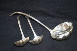 Three silver plated punch spoons