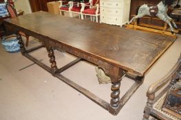 A large Victorian oak refectory table on barley twist legs