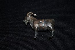 An Edwardian silver novelty pin cushion (lacking cushion) in the form of a goat by Allday and