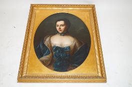 An early 18th century portrait of a lady in a blue dress (H 56.5cm W 71.0)