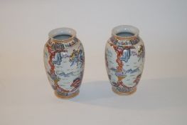 Pair of tall Oriental vases