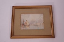 A signed watercolour of a river scene, dated 1916