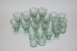 12 large green wine glasses and 10 tumblers