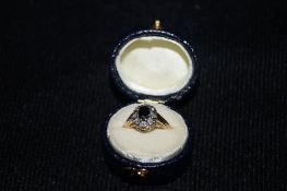 9ct Gold, Diamond and Blue centre stone ring
