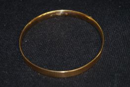 Large Bangle marked "Albion 9ct Gold"