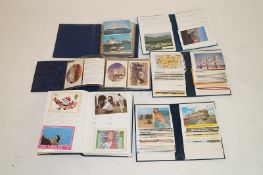 A large collection of mostly modern postcards