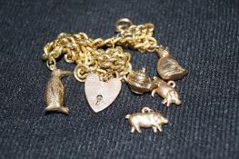 9ct Gold Charm Bracelet along with various 9ct charms