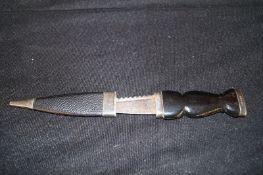 A silver hall marked silver Sgian Dubh by J Aitchman 1911 with bog oak handle