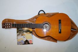 Acoustic six string guitar