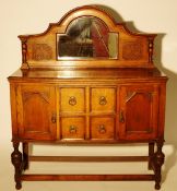 An Oak sideboard, with mirror mantle top