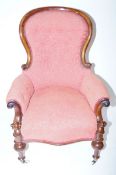 Red upholstered spoon back chair