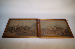 A pair of hunting prints in gilt frames