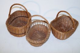 Three wicker shopping baskets