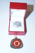 Silver Manchester United ring and medallion