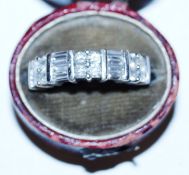 A diamond and Gold ring marked "750"