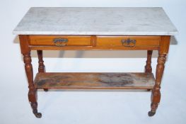 A marble top sideboard