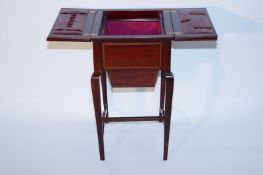 A mahogany Victorian workbox, with fitted interior