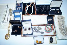 A large collection of costume Jewellery including silver earnings and other items