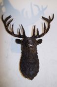 A life size bronze stag head