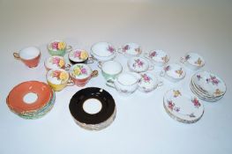 Complete tea service with coloured gold edging and one other tea service