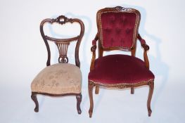A mahogany armchair, along with an Edwardian chair