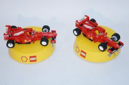 Two F1 toy Lego cars