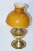A brass oil lamp