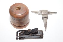 A watchmaker's anvil and other items