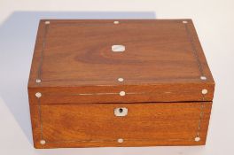 A mahogany inlaid box