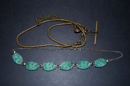 Two old watch chains and one green stone necklace